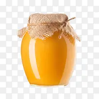橙色液体用麻布捆绑密封的广口瓶