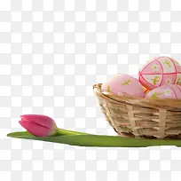 粉红色庆祝复活节食用彩蛋和鲜花