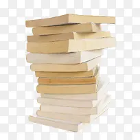 棕色排列不整齐的堆起来的书实物
