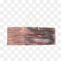 棕色带黑色斑驳痕迹挂着的木板实