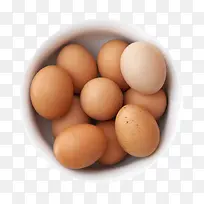 褐色鸡蛋碗里的一堆初生蛋实物