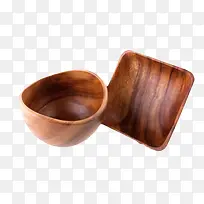 深棕色容器弯曲口木制碗和碟子实