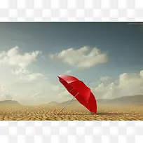蓝天白云沙漠里的小红伞