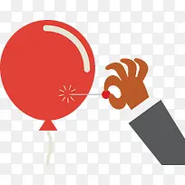 一个人用针扎一个红色的气球