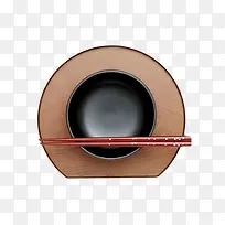 棕色木质纹理圆木盘和木筷子和黑