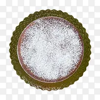 绿色圆形铺满白色颗粒的蛋糕