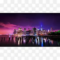 紫色夜空灯火通明的城市海报背景