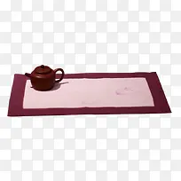 茶壶和红色茶席图片素材