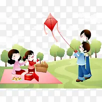 草地上野餐放风筝的一家人