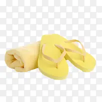 黄色不易吸水的海边沙滩鞋和毛巾