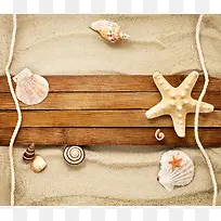 海星贝壳与沙滩木板背景