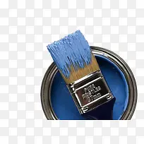 蓝色油漆桶和沾着油漆的刷子