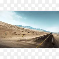 荒凉沙漠中的公路海报背景