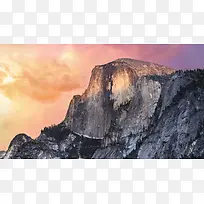 夕阳下的山崖海报背景