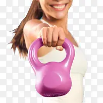 健身美女手拿粉紫色壶铃