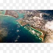 天空中俯视的海边城市海报背景