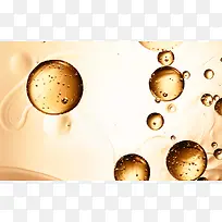 金色透明液体气泡海报背景