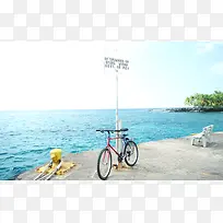 海边上的自行车海报背景