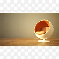 黄色背景下的橙色圆椅
