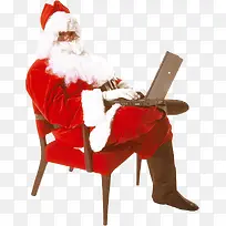 圣诞老人拿着电脑的圣诞老人