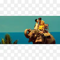 大象背上的幸福海报背景