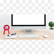 盆栽与空白显示的电脑屏幕