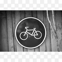 木头上的自行车行驶图标背景图