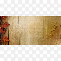 木板上的落叶背景图