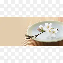 日系清新文艺餐具饮食文化樱花餐盘背景