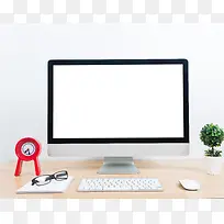 盆栽与空白显示的电脑屏幕