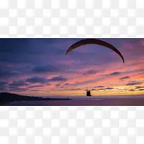 黄昏滑翔伞背景图