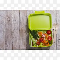 饭盒番茄萝卜芹菜蔬菜沙拉背景