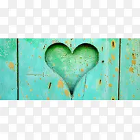 绿色爱心纹理木板背景图