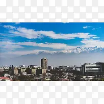 城市建筑山景天空雪山